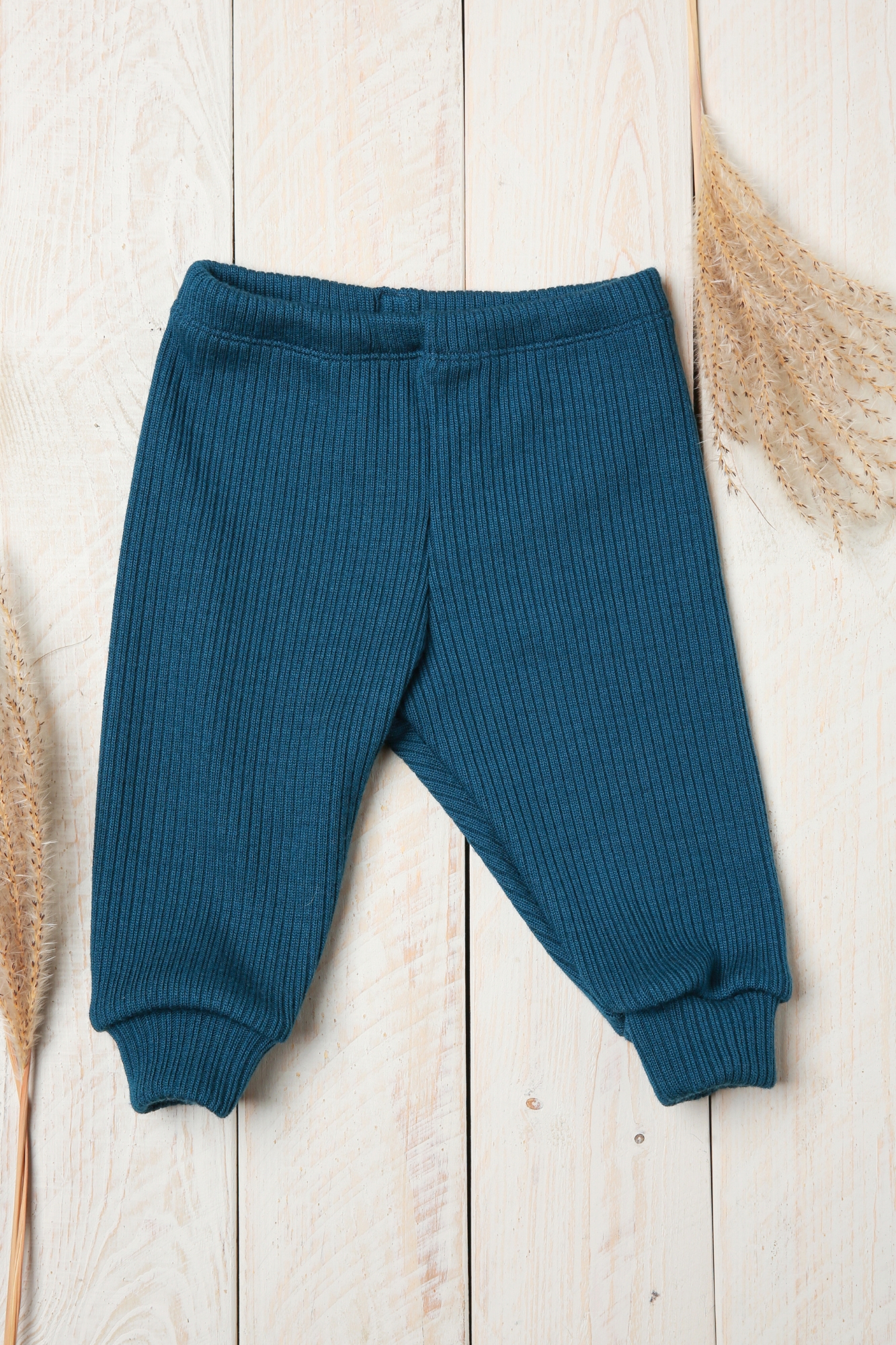 megztos-vaikiskos-kelnes Megztos vaikiškos kelnės iš 100% merino vilnos mėlyna