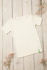 Apatiniai marškinėliai vaikams trumpomis rankovėmis iš merino vilnos – švelnūs, kvėpuojantys, patogūs sluoksniavimui, baltos (natūralios spalvos)